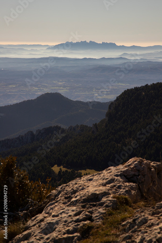 Montserrat mountains creating a layered landscape with mist