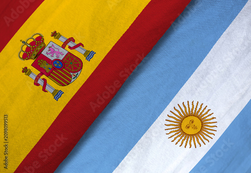 Fotografía Close-up of Spain and Argentina flags side by side, symbolizing international relations, diplomacy, or football rivalry