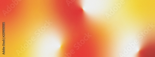 Abstract gradient background featuring warm vibrant colors like red and yellow blending softly with bright white light effects creating a dynamic and energetic feel