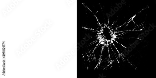 Fotografie Closeup of a shattered glass surface with sharp cracks and a central impact poin
