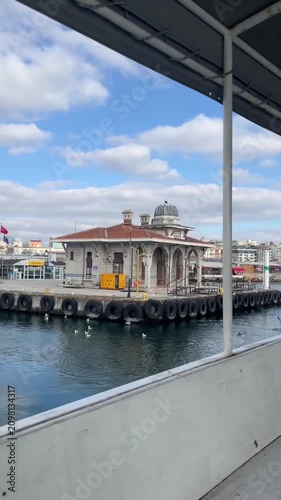 the ferryboat leaving the Bostancı port to prince Islands in Istanbul Clear weather white clouds beautiful historical port building. 