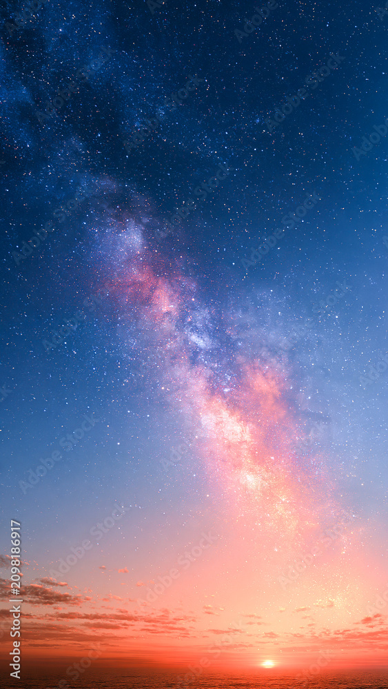 Fototapeta premium 夕焼けの地平線と夜空に広がる紫色の天の川