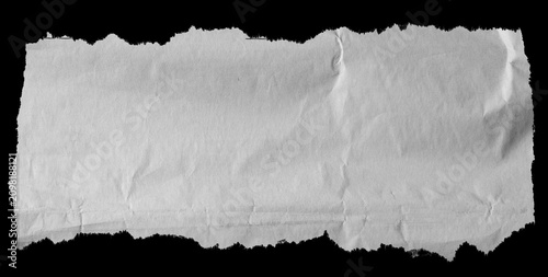 Torn paper on black