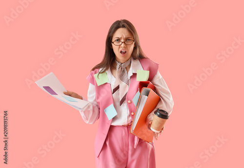 Overwhelmed young businessw...