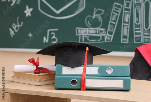 Graduation cap with diploma...