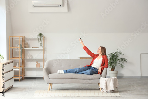 Young woman relaxing on a s...