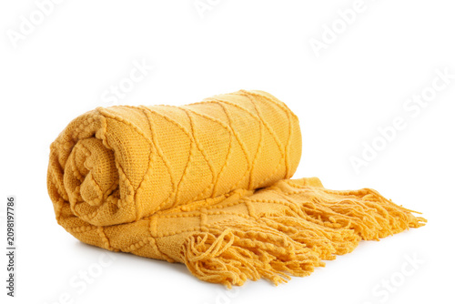 Rolled up yellow knitted bl...