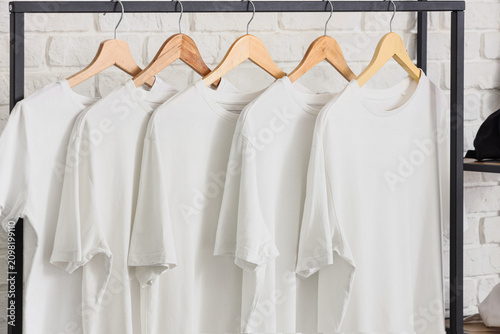 Row of blank white t-shirts...