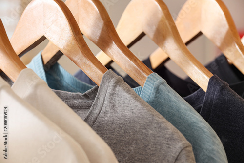 Row of wooden hangers with ...