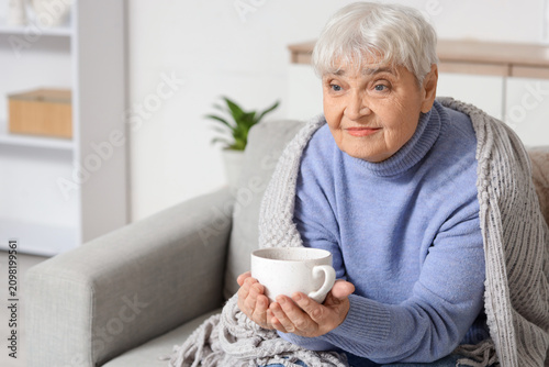 Thoughtful senior woman wit...