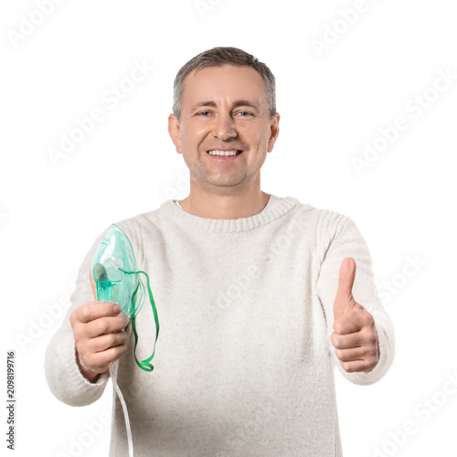 Mature man with nebulizer s...