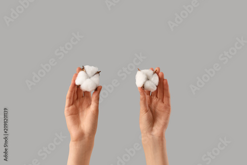 Female hands with cotton fl...