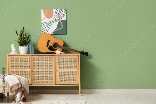 Wooden cabinet with acousti...