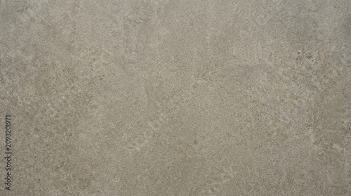Close-up of Concrete Surface with Texture and Color Variations.