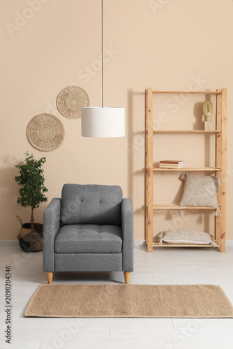 Armchair, shelving unit and...