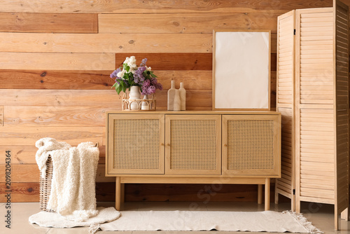 Stylish cabinet and vase wi...