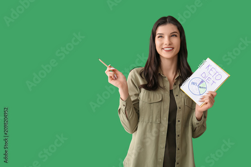 Happy smiling young woman h...