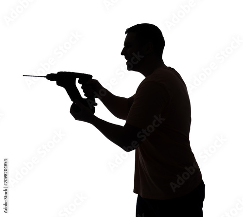 Silhouette of young man wit...