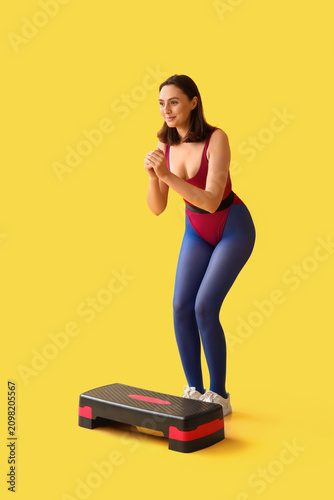 Sporty young woman training...