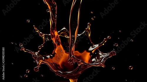Dark amber liquid pouring from a flagon in a dynamic splash.