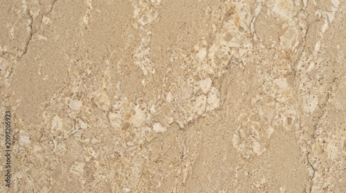 Close-up of Beige Textured Stone Surface for Background or Design Use.