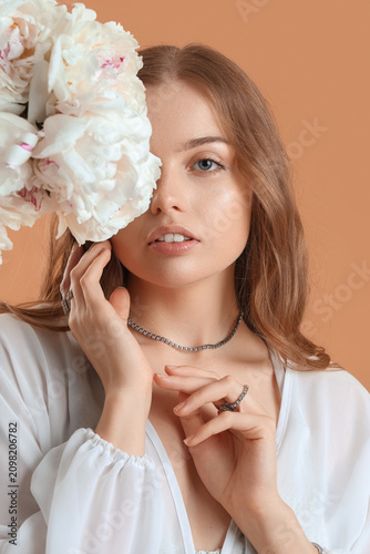 Beautiful young woman with ...