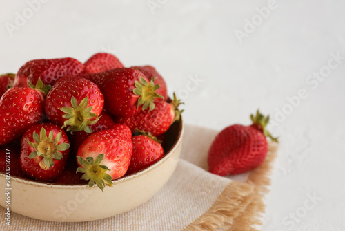 Bowl with fresh strawberrie...