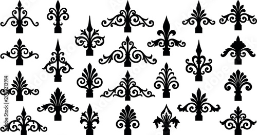 Obraz na płótnie Ornate wrought iron fence toppers and fleur de lis silhouette toppers set classi