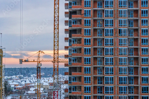 Fotografi Construction of a high-rise monolithic frame building