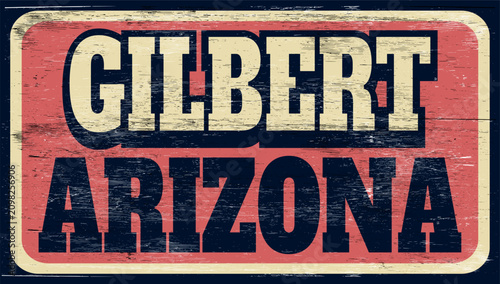 Aged retro Gilbert Arizona sign on wood