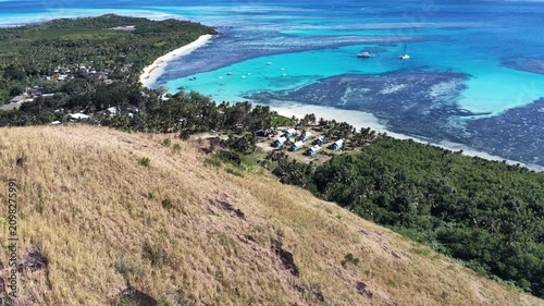 Drone view of a tropical beach and hills, Oarsmans Bay, Nacula Island, Fiji