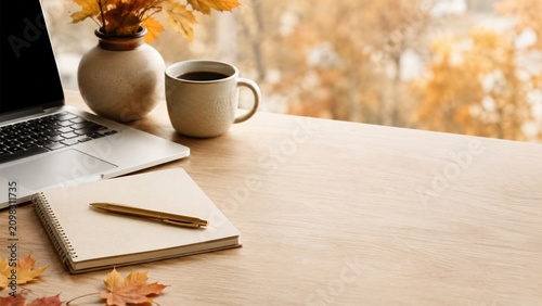 Autumn Home Office Desk With Laptop Coffee Notebook Leaves And Copy Space