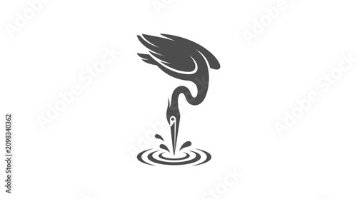 Foto Bird Diving into Water Surface.