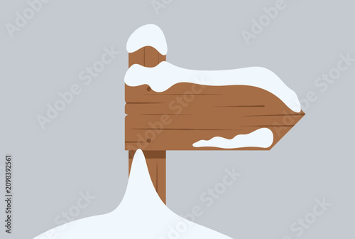 Blank wooden arrow signpost covered in fresh white snow stands pointing to the right against a gray background.