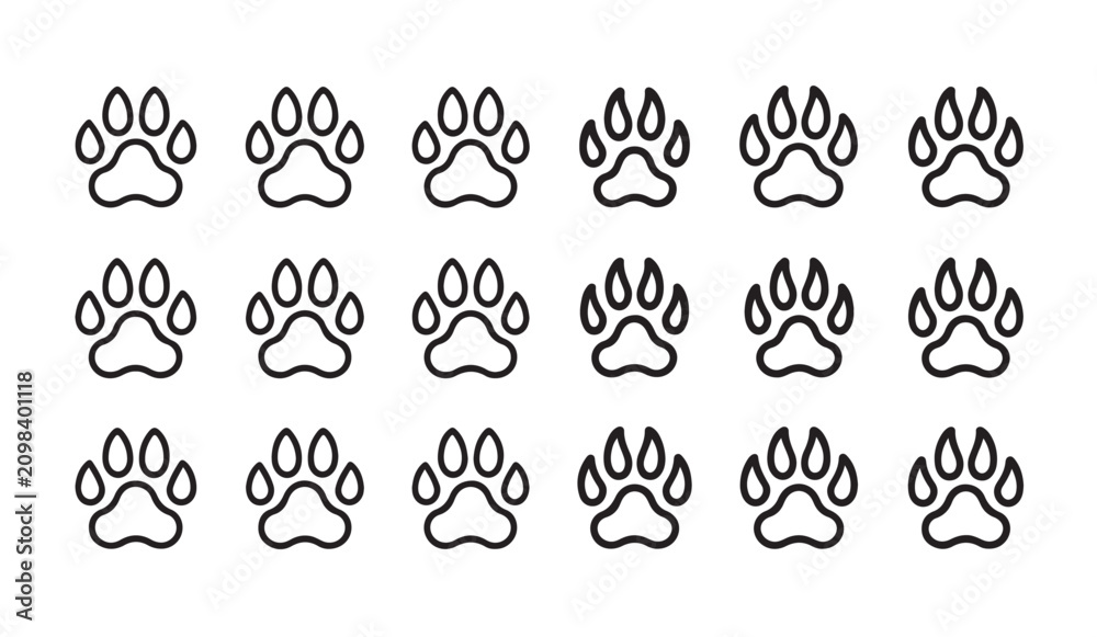 Fototapeta premium Set of paw prints isolated on white background simple outline animal footprints collection.