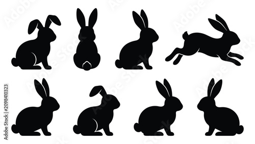 Tableau sur toile Rabbits sit and jump in different poses across this collection of animal silhouettes