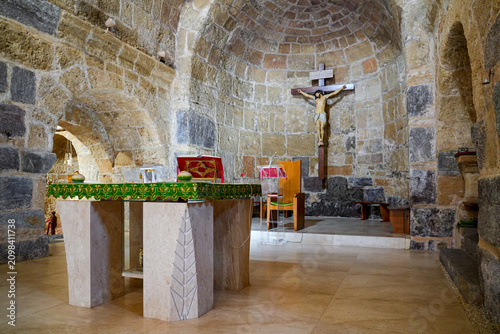 Main altar and crucifix inside the Basilica of Saint Antiochus (Basilica di Sant'Antioco Martire) in Sardinia, Italy