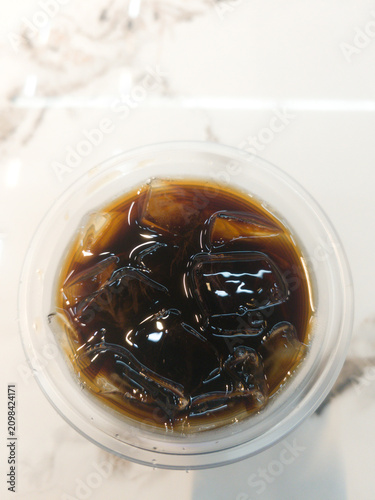 Iced black coffee.