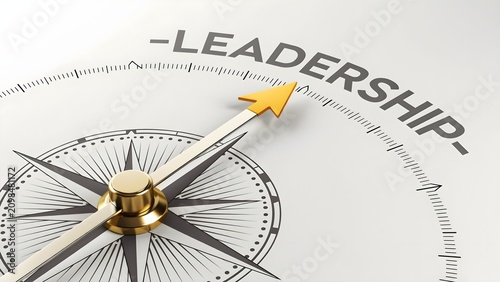 Leadership concept with golden compass needle pointing to word on white background with ruler markings
