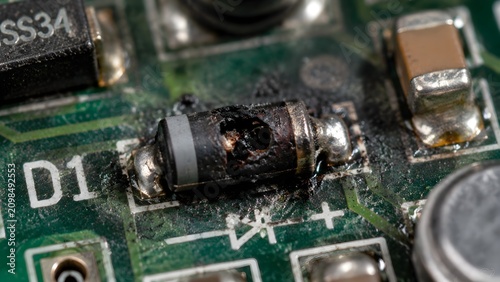 Burnt Diode on Voltage Regulator Board Captured in Extreme Macro Electronic Damage Detail Concept Photography