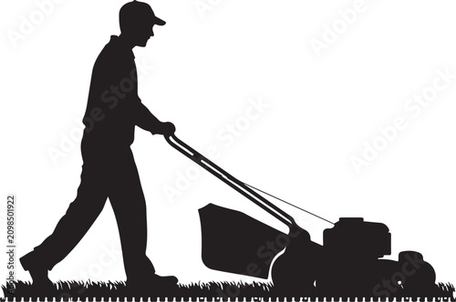 Fotografie Man pushing lawn mower on grass