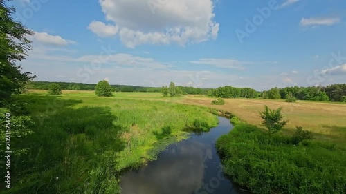 Low FPV Flight Above the Small Grabia River in Central Poland on a Summer Day