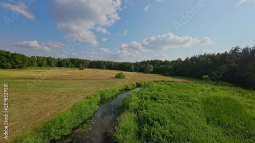 Low FPV Flight Above the Small Grabia River in Central Poland on a Summer Day