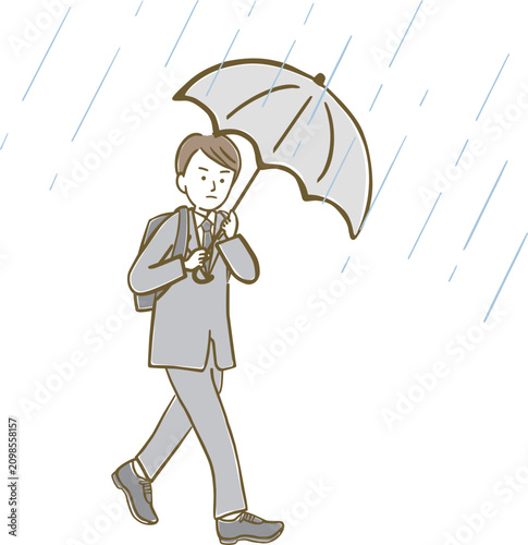 雨風強い中、傘をさして歩くスーツ姿の男性