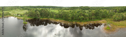 Photos turf landscape with trees and wrack water lake panoramic view and sky isolated o