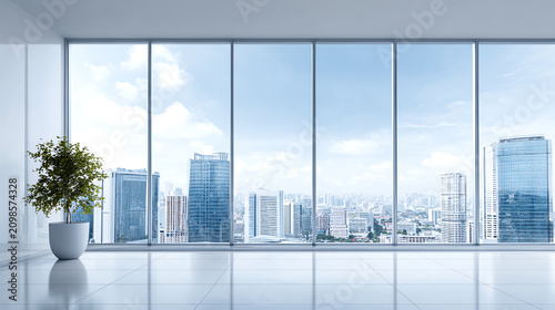 Modern office space featuring large windows, panoramic city views, and a potted plant, creating a fresh and inviting atmosphere.