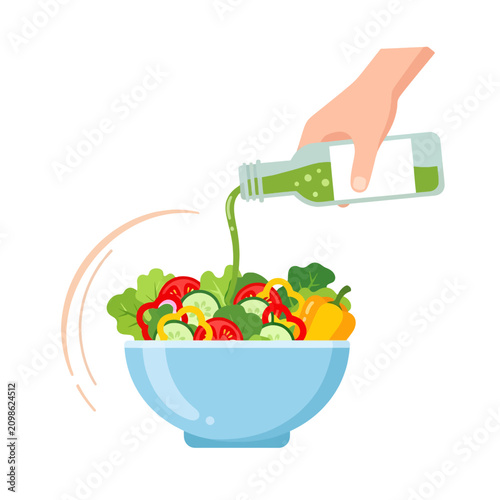 A hand pours fresh green dressing over a colorful vegetable salad in a bowl