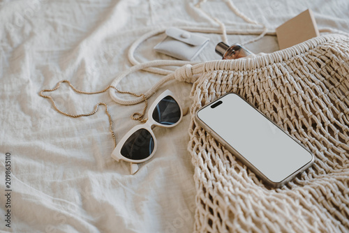 Bild auf Leinwand Eco-Friendly Bag with Tech and Sunglasses, Natural Tones and Clean Aesthetic