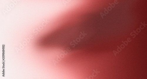 Abstract background, featuring a smooth, gradient transition from, light pink to, deep dark red, with soft blurred, light and grainy, texture effects