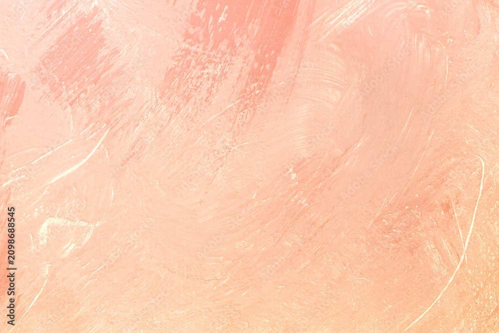 Fototapeta premium Soft pink paint texture on canvas shows brush strokes and layers from an art project made in a studio during daytime